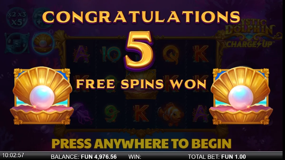 Interface do jogo de slot Mystic Dolphin Charge Up com golfinhos e recifes de coral